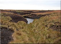 SD9914 : Pond in the peat, Way Stone Edge, Rishworth, Ripponden CP by Humphrey Bolton