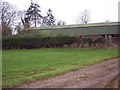 Barn With Laurel Hedge