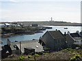 View over Portnahaven rooftops to Orsay