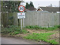 Road sign for the village of Ashley.