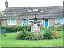 TL7596 : Northwold; village sign by Snidge