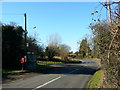 Postbox, phone box and bus stop, West Grafton, Wiltshire