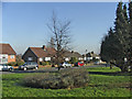 Green at top of Lakenheath at junction with Chase Road, Gerrards Close maisonettes in the background.