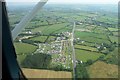 Aerial view of crossroads of A487 and B4333 near Tan-Y-Groes.