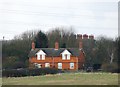 Cottages close to A6003 junction with the Newton road