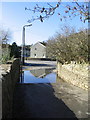 Flooded bridge over the River Brit