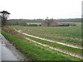 View across fields to rooftops at Singledge