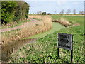 Road, dyke and footpath