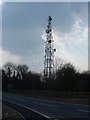 Telecoms mast and remade road to Bourn