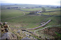 NY7567 : Hadrian's Wall and Turret near Peel by Phil Champion