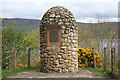 The memorial to John Cobb overlooking Urquhart Bay.