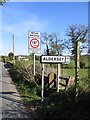 Stile and Road Signs at Coddington