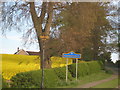 Two signs at the beginning of Mainsforth village