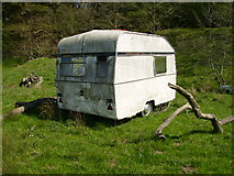 SE6474 : Derelict caravan near the man made pond at Soulby Wood by Phil Catterall