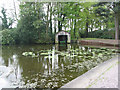 Boathouse on ornamental lake, Capesthorne Hall