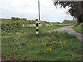 Triangle with an old wooden sign