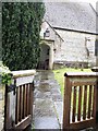 Church gate and porch at Holy Trinity Church, Easton Royal