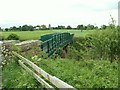 Footbridge over  West Coast Main Line near  Newbiggin Hall