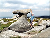 SK1196 : Bleaklow Stones hanging on the Anvil Stone by John Fielding