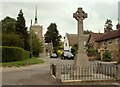 The War Memorial and parish church at Hinxton