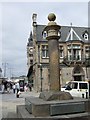 Stone pillar at junction of Horsemarket with West Row