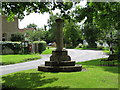 Cross and village green at Stow Longa