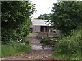 Ford and farm buildings