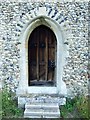 Door with sun dial above it at St. Mary