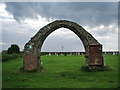 NX9821 : Stone arch,St Bridget's Church, Moresby by Alexander P Kapp