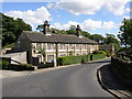 SE1326 : Row of houses, Syke Lane, Priestley Green, Hipperholme by Humphrey Bolton