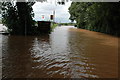 The flooded A38 through Severn Stoke