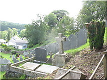SH8022 : A little nearer to heaven - steeply sloping graveyard at Rhydymain by Eric Jones