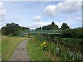 SJ9801 : Footbridge over the Curly Wyrley by John M