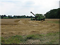 TF9523 : Combine harvester waiting to unload near Gateley by Zorba the Geek