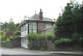 A character house alongside the A470