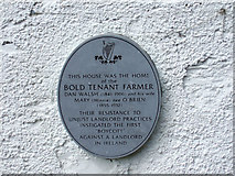 W4046 : Wall Plaque on The Bold Tenant Farmer's Cottage Ballinascarty by Mike Searle