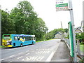 The stop for north-bound buses at Y Ganllwyd