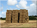 A stack of square straw bales