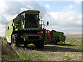 A combine harvester parked in a field