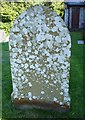 Lichen covered gravestone