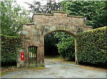 NY4738 : Imposing gateway with postbox, Brackenburgh Estate by Rose and Trev Clough
