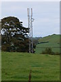 SJ0647 : Telecommunications mast near Gwyddelwern by Eirian Evans