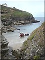 Boat arriving at Port Gaverne