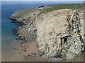 SX0587 : Cliffs at Hole Beach by Trevor Rickard
