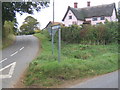 Triangular lane junction and cottage