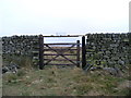 SE1272 : Gate in drystone wall topped with a trap by Mick Borroff