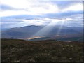 NN5397 : Sun beams lighting up the glens by Andrew Spenceley