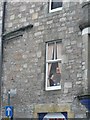 Pitlochry: painted window detail