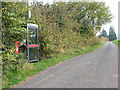 Phone box and postbox north of Dancing Green