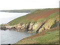 SH1529 : Caves in the headland leading to Dinas Bach by Eric Jones
